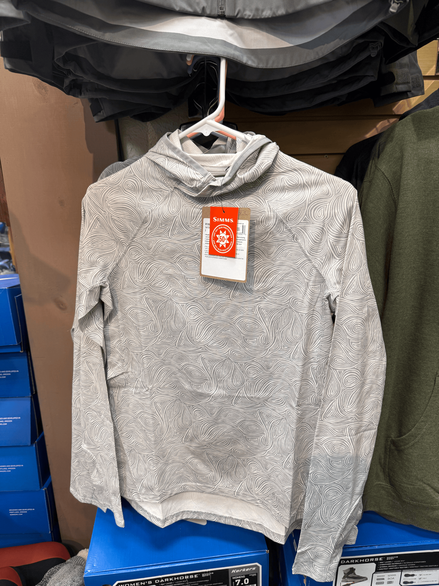 Simms apparel on display at The Patient Angler